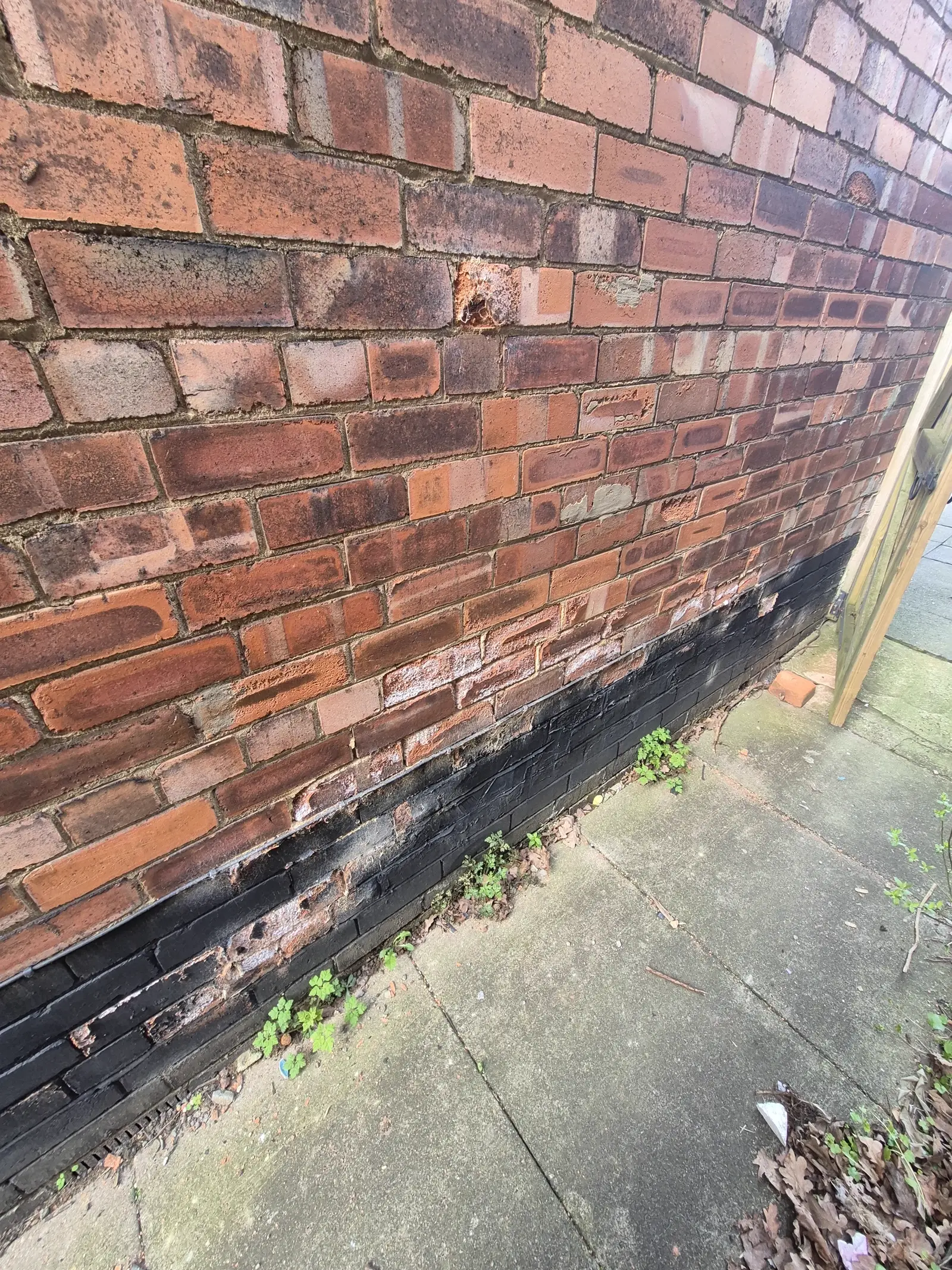 Spalling brickwork and salt staining found during an LWR damp survey in Lincoln
